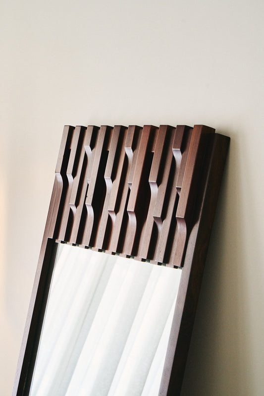 Norman wall mirror by Luciano Frigerio, 1970s
