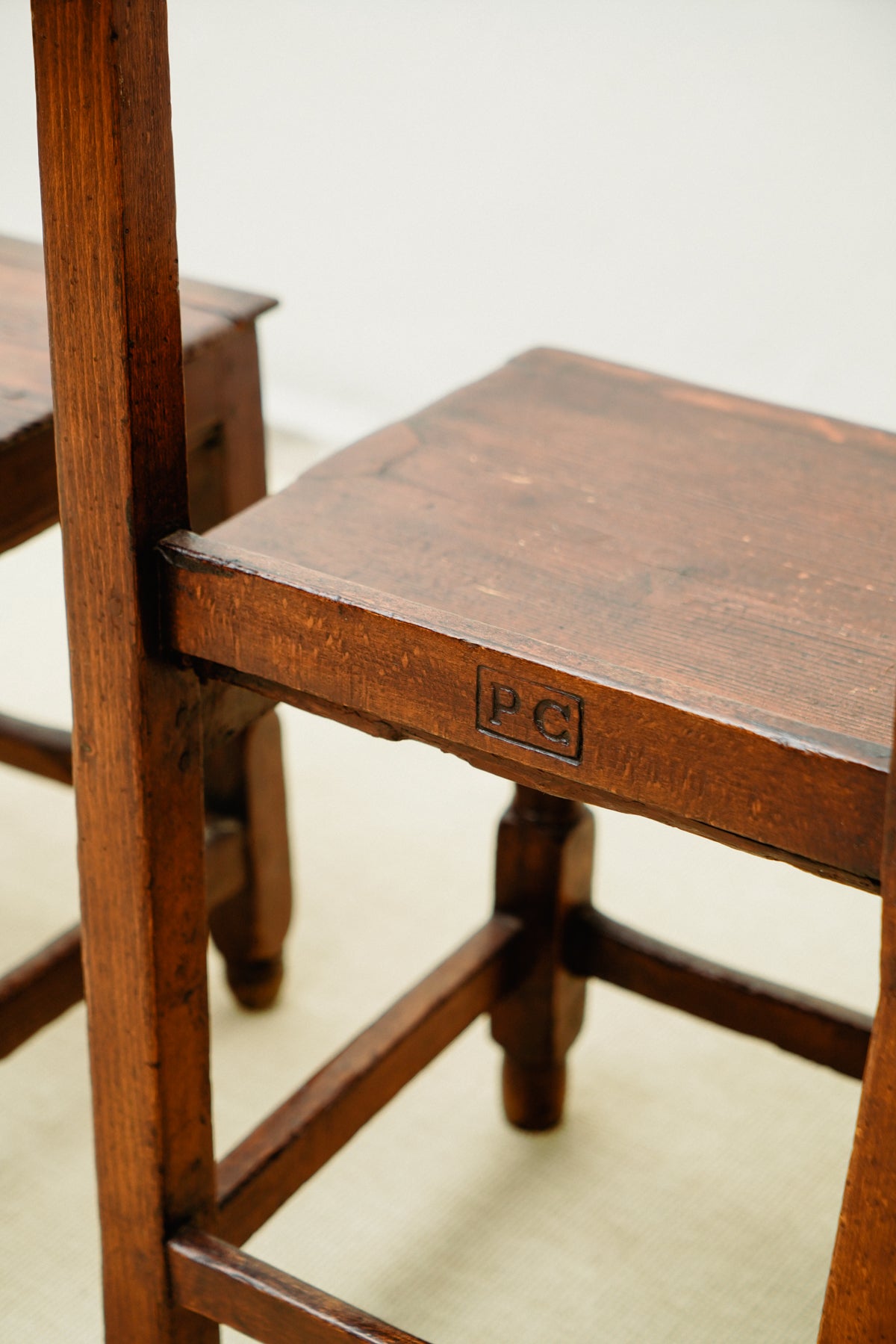 Small wooden chairs with high back rest