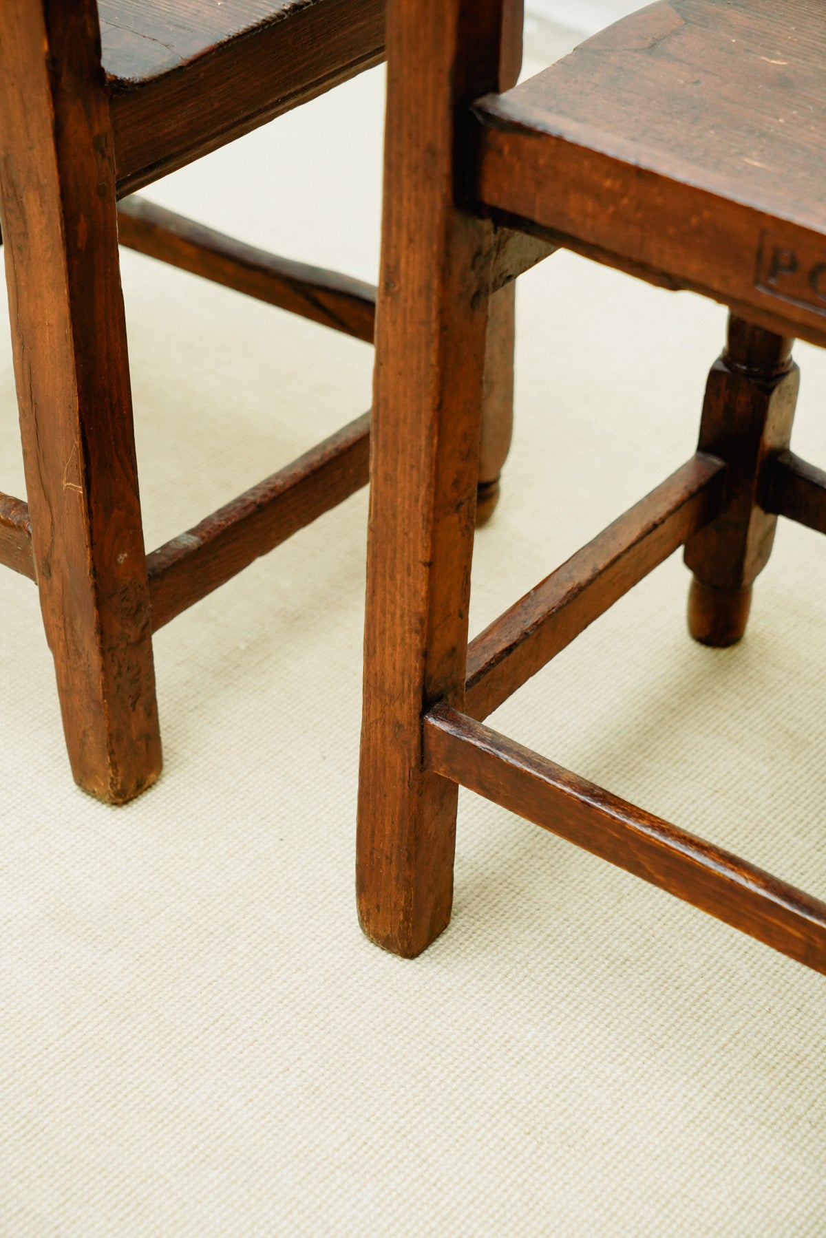 Small wooden chairs with high back rest