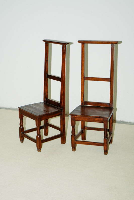 Small wooden chairs with high back rest