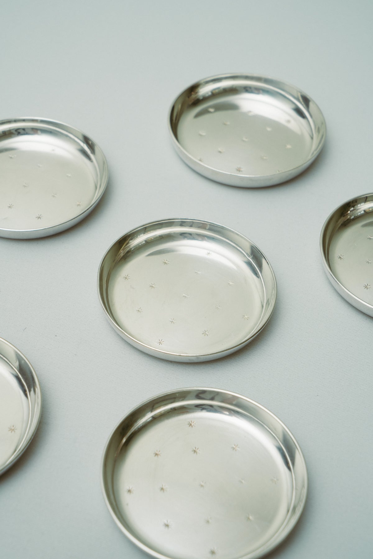 Christofle mini plates/ ashtrays, set of 9
