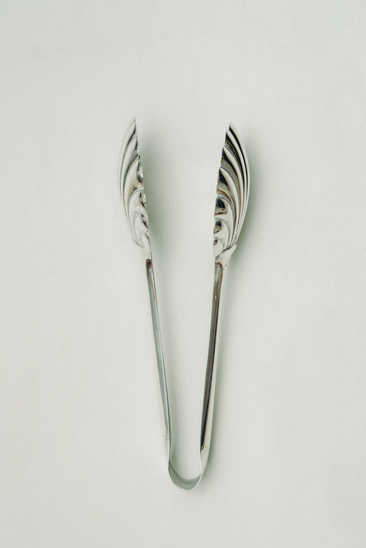 Shell shaped tongs