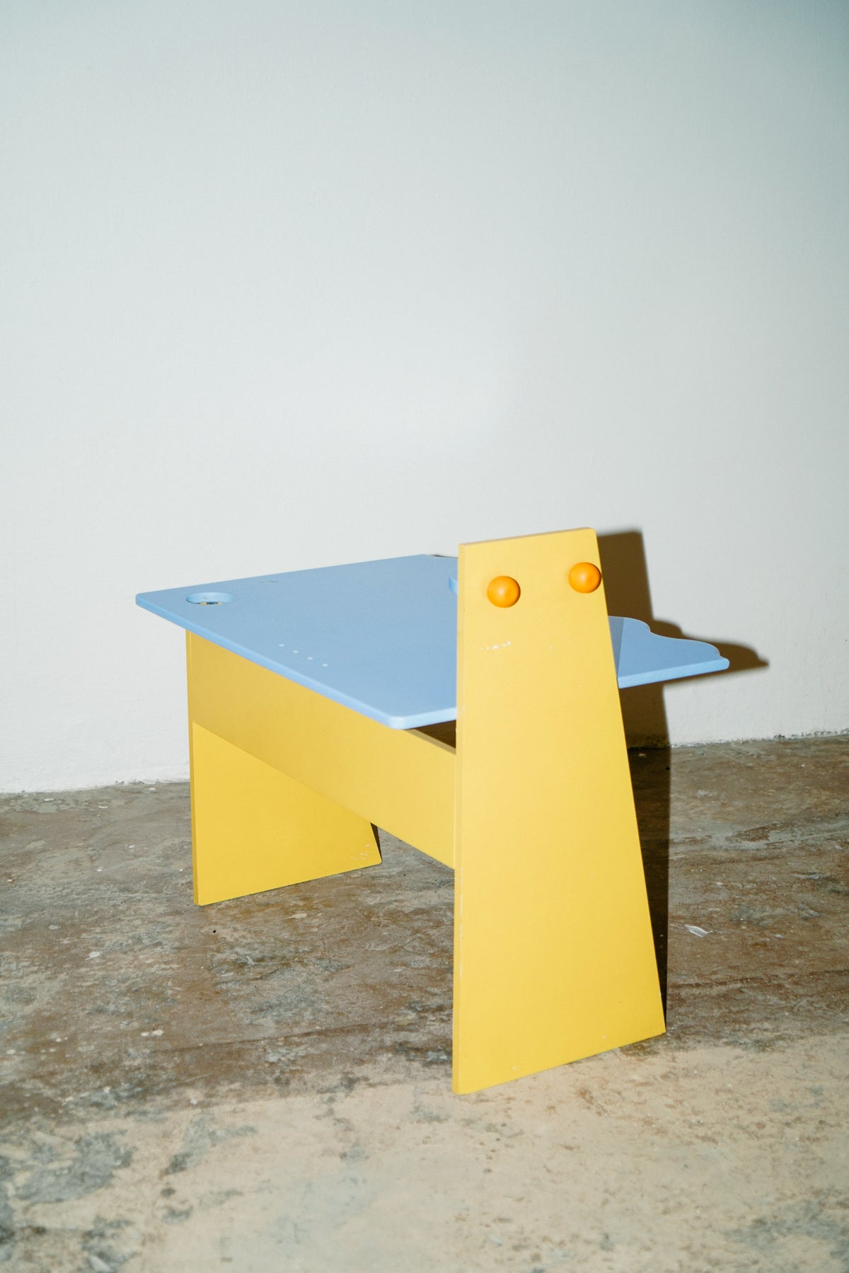 Blue and yellow kids desk