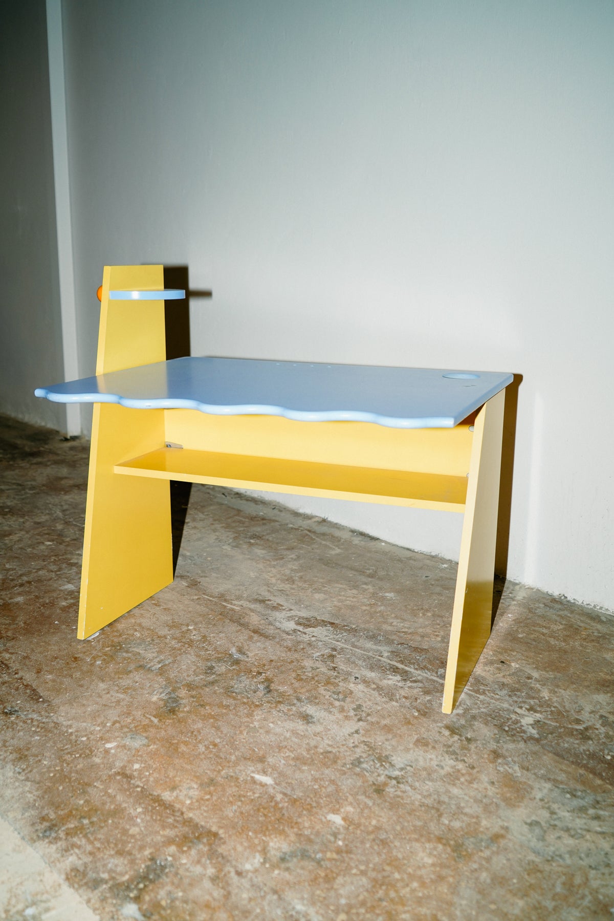 Blue and yellow kids desk