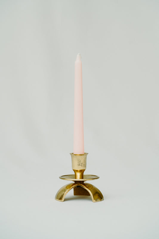 Three legged brass candle holder