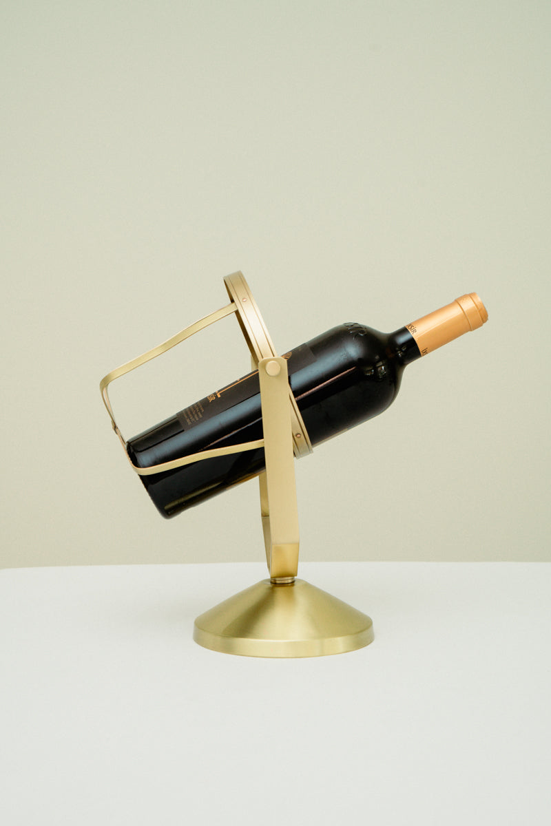 Brass wine bottle holder
