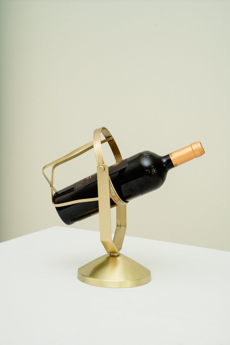 Brass wine bottle holder