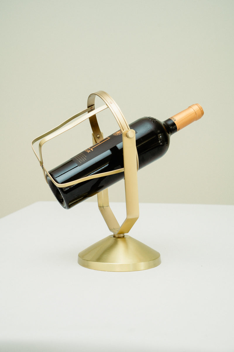 Brass wine bottle holder