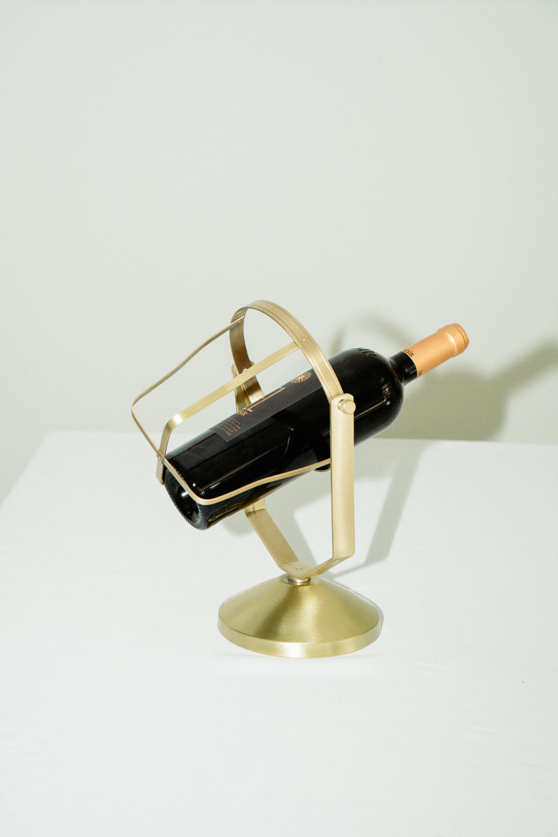 Brass wine bottle holder