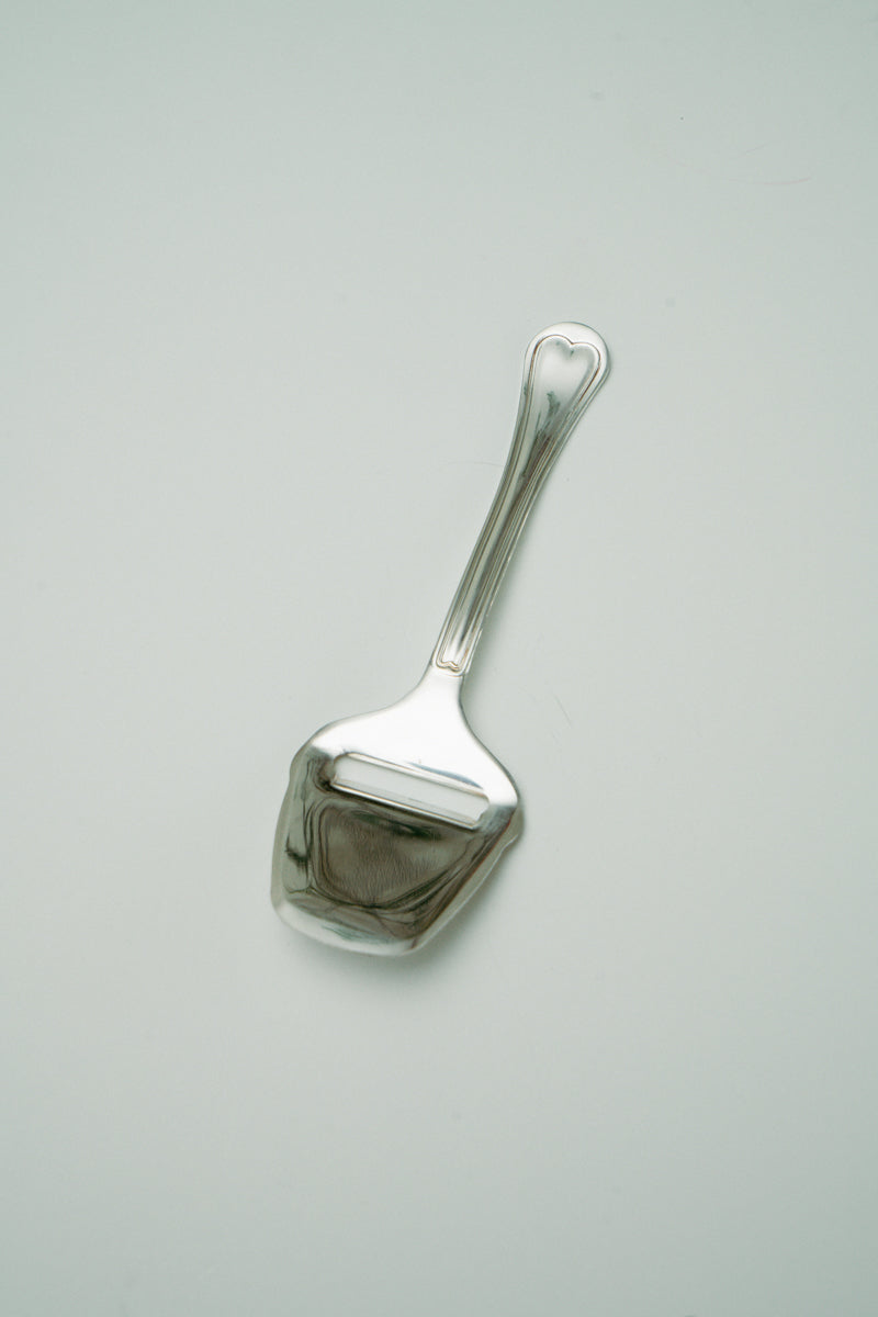 Cheese slicer spoon