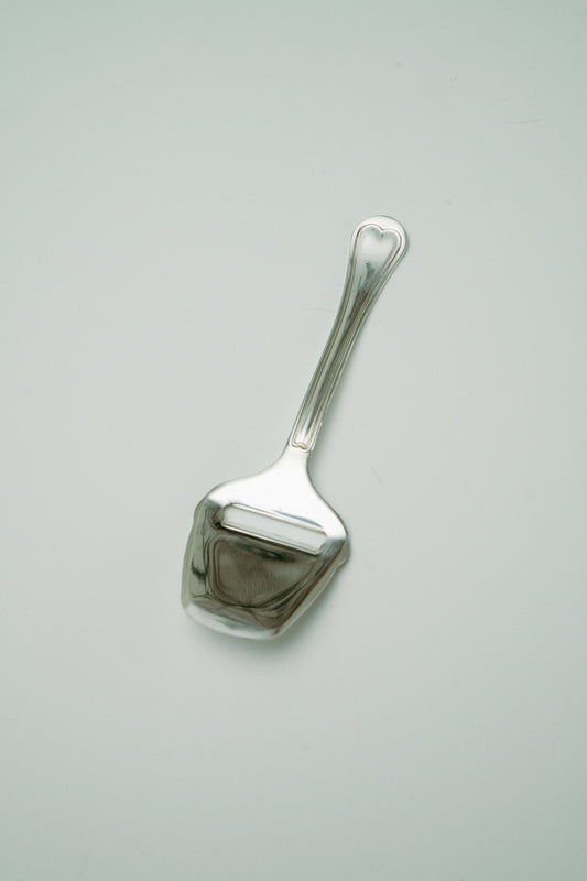 Cheese slicer spoon