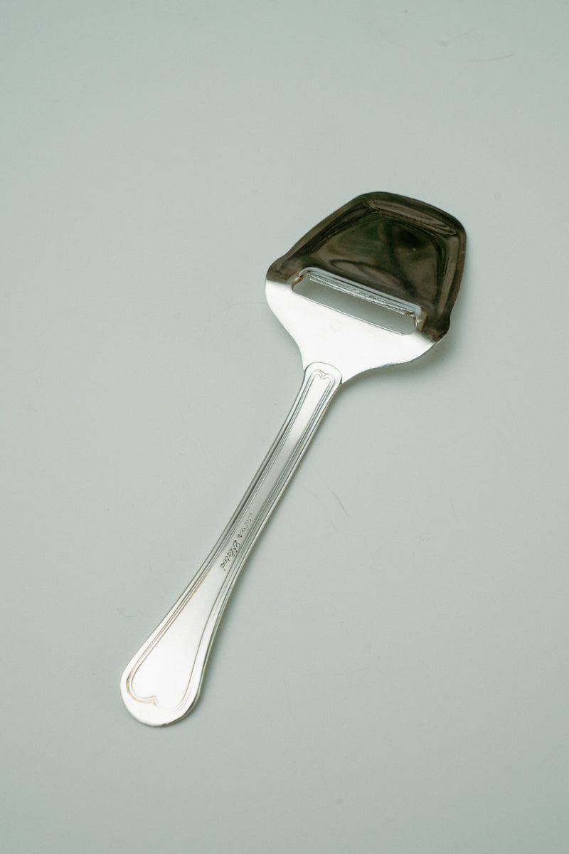 Cheese slicer spoon