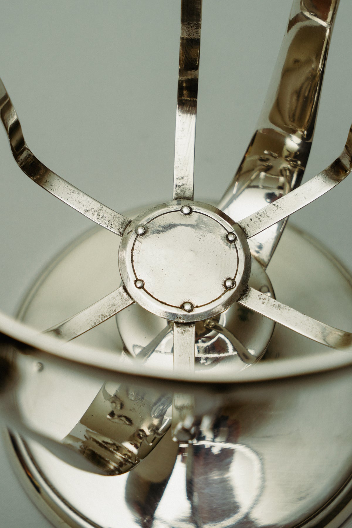 Swinging bottle holder