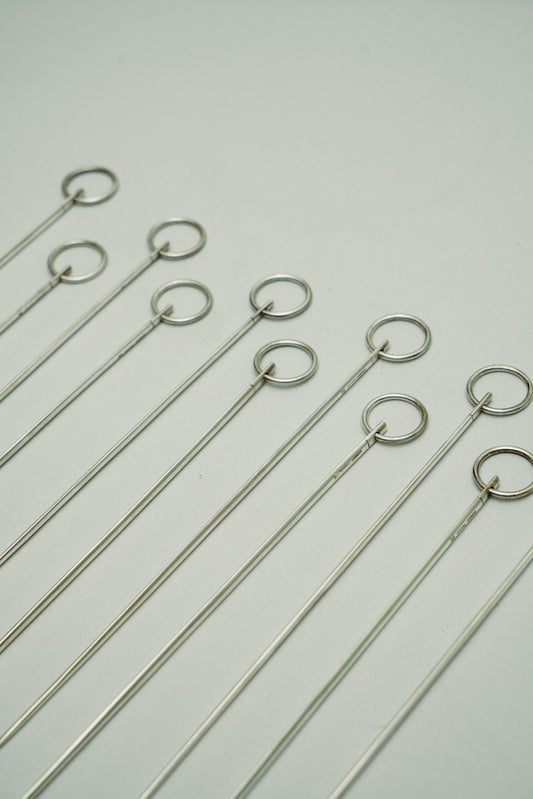 Set of 11 Christofle skewers with hanging loop