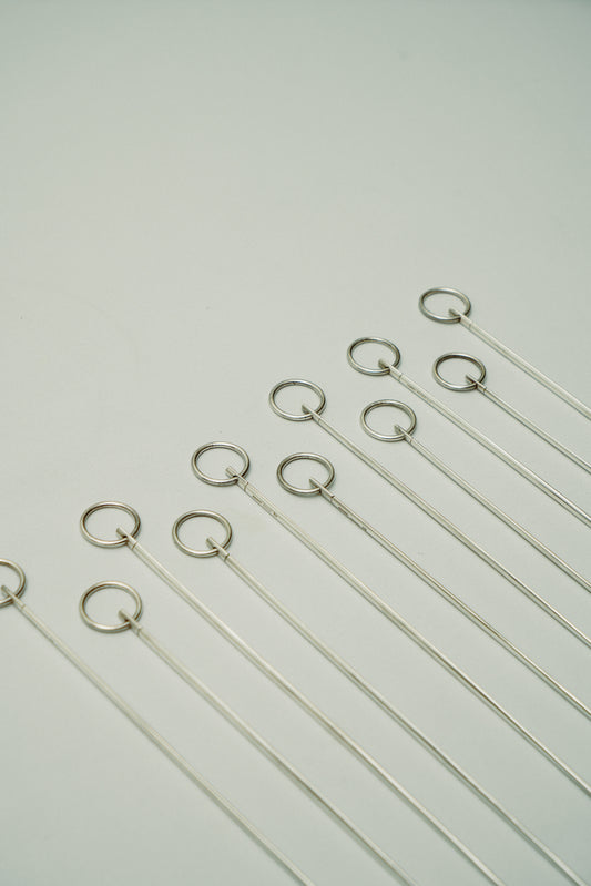 Set of 11 Christofle skewers with hanging loop