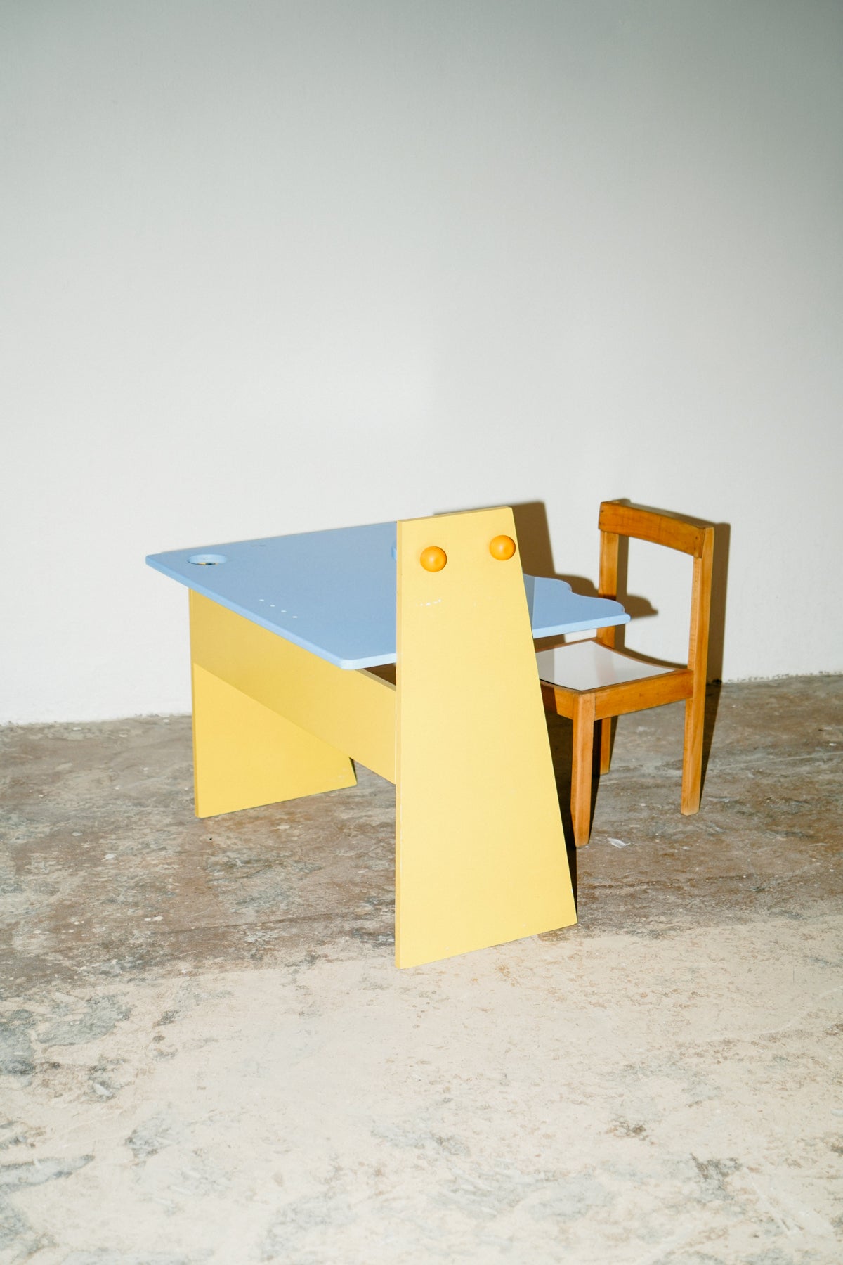 Blue and yellow kids desk