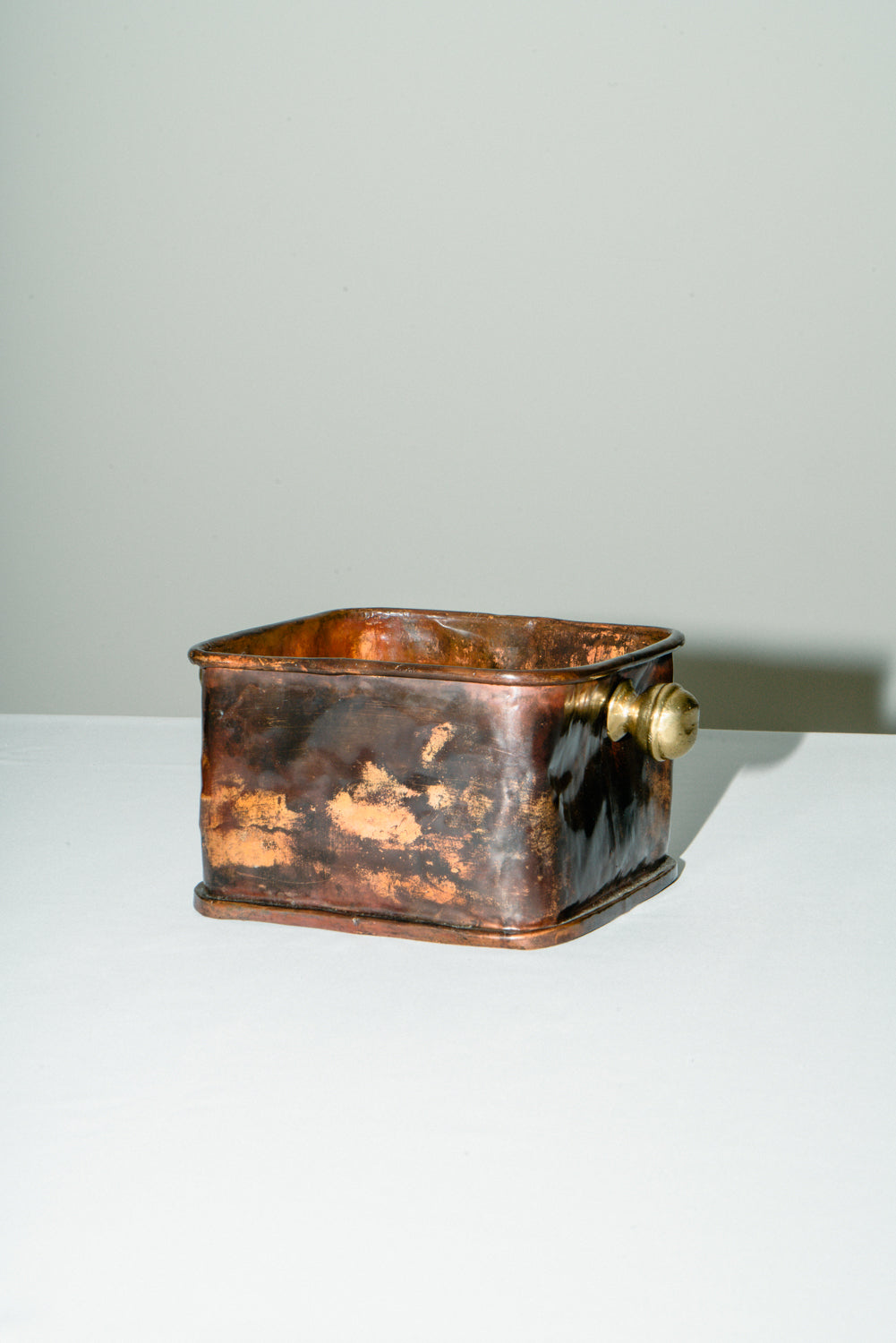 Copper box with brass knobs