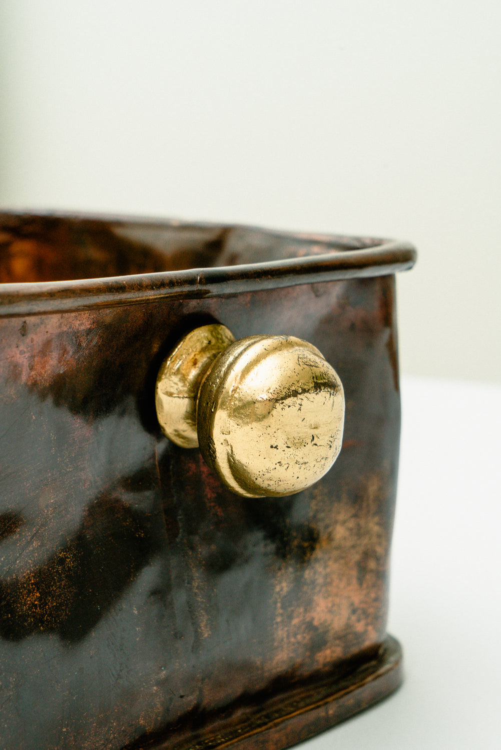 Copper box with brass knobs