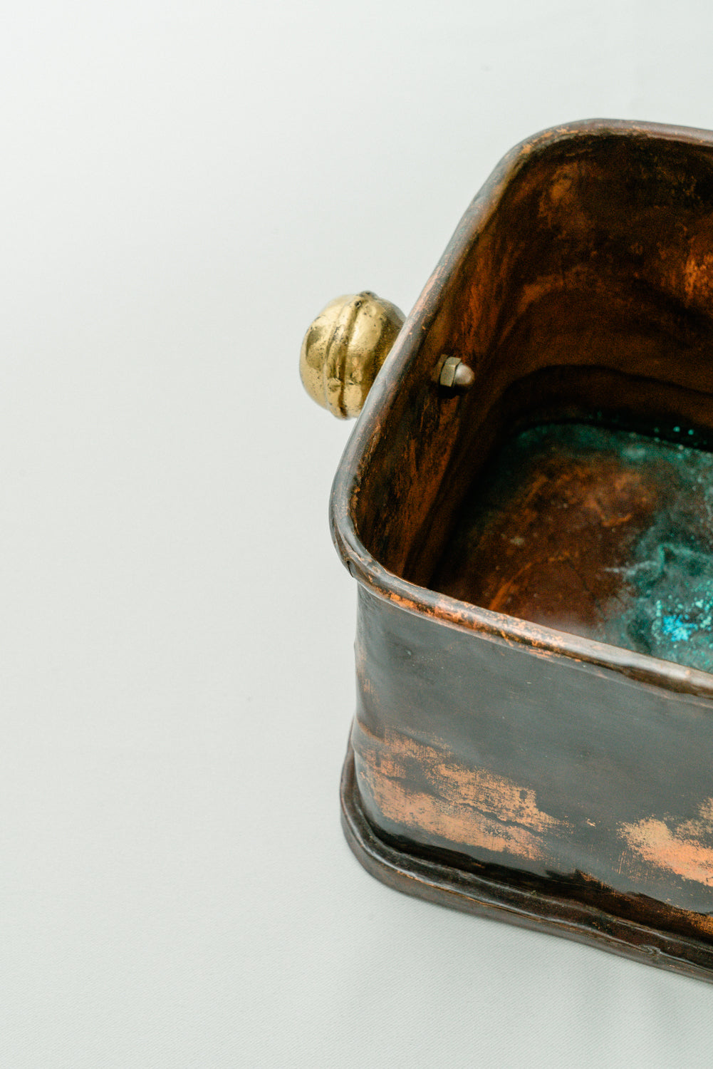 Copper box with brass knobs