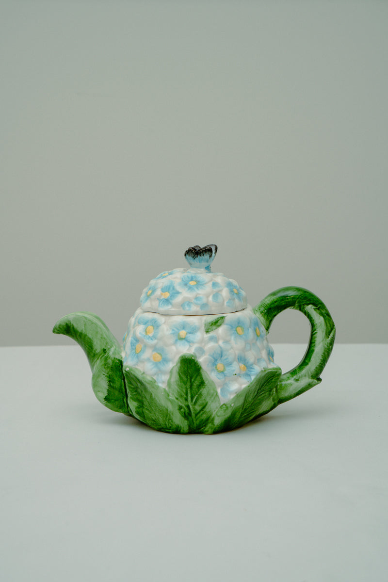 Ceramic teapot with delicate blue flowers