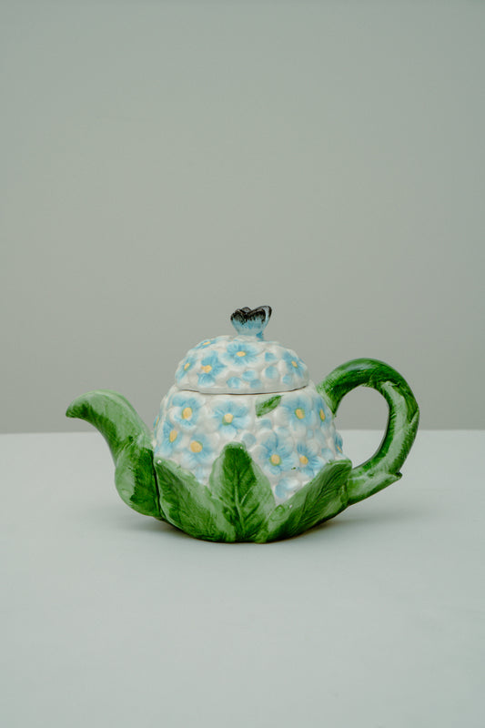 Ceramic teapot with delicate blue flowers