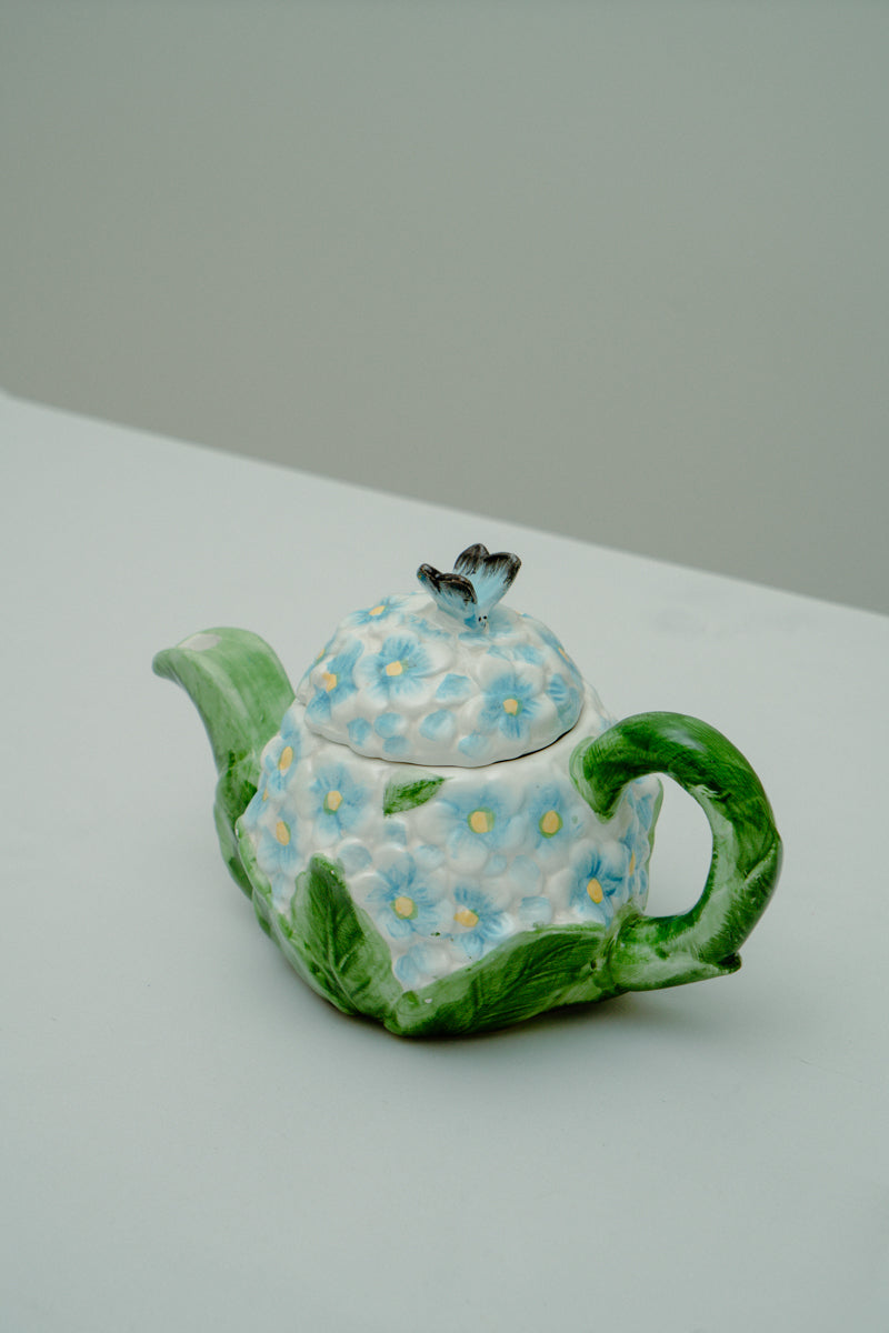 Ceramic teapot with delicate blue flowers