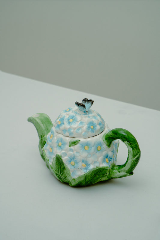 Ceramic teapot with delicate blue flowers