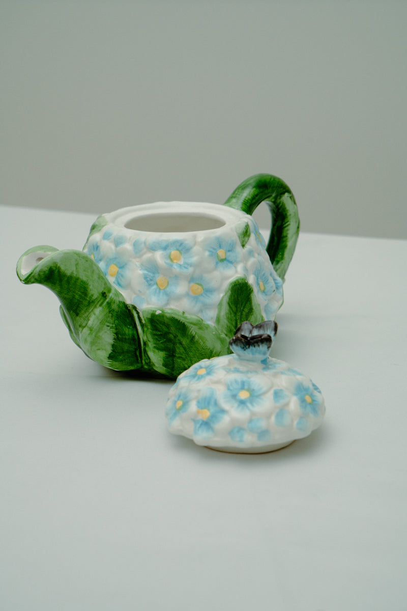 Ceramic teapot with delicate blue flowers