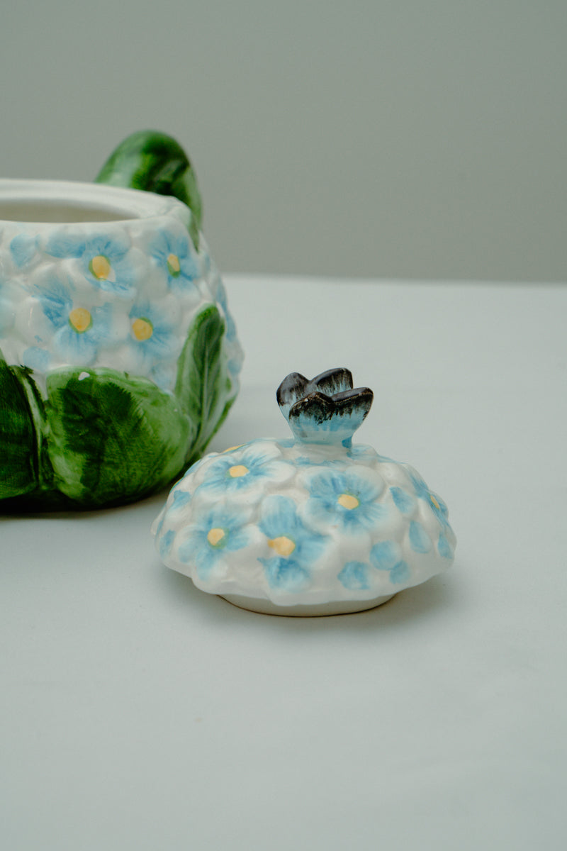 Ceramic teapot with delicate blue flowers