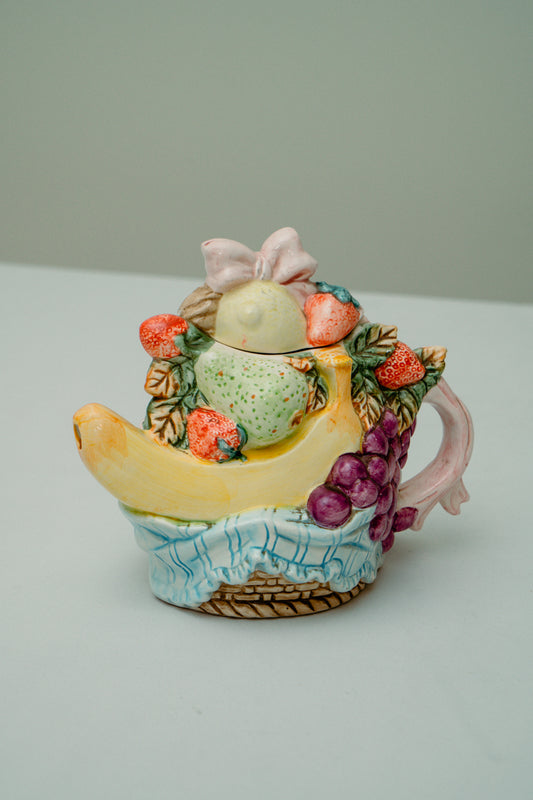 Ceramic teapot with fruits