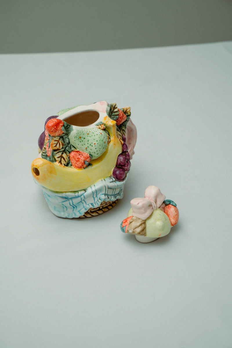 Ceramic teapot with fruits