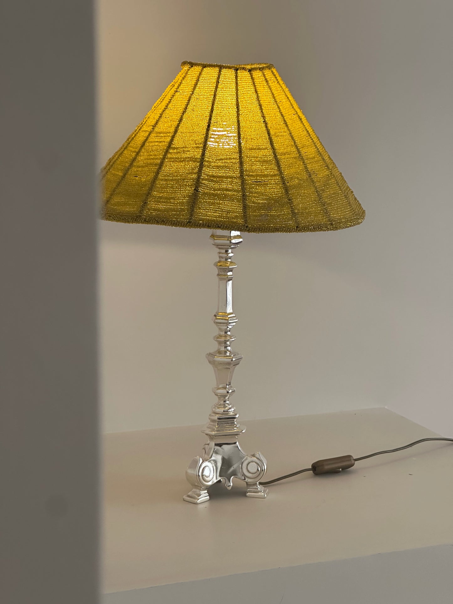 Silver table lamp with beaded lampshade